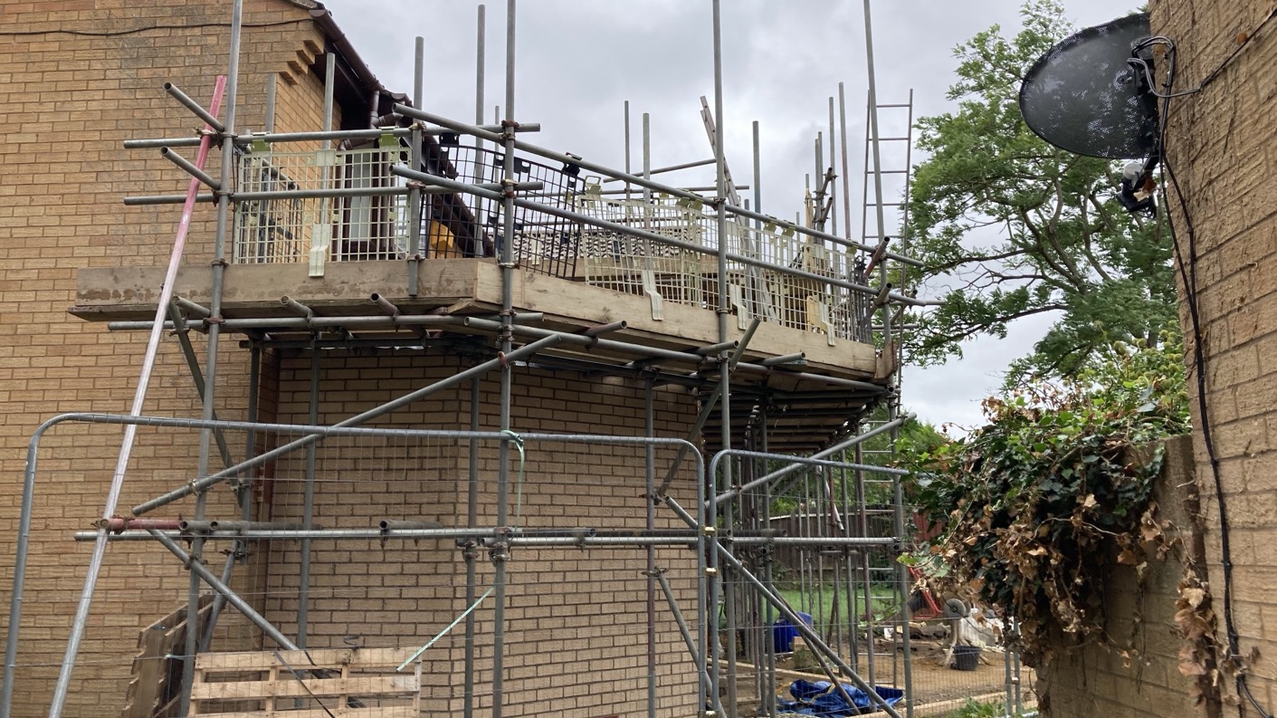 Building extension above the garage and at the rear in Oldbrook