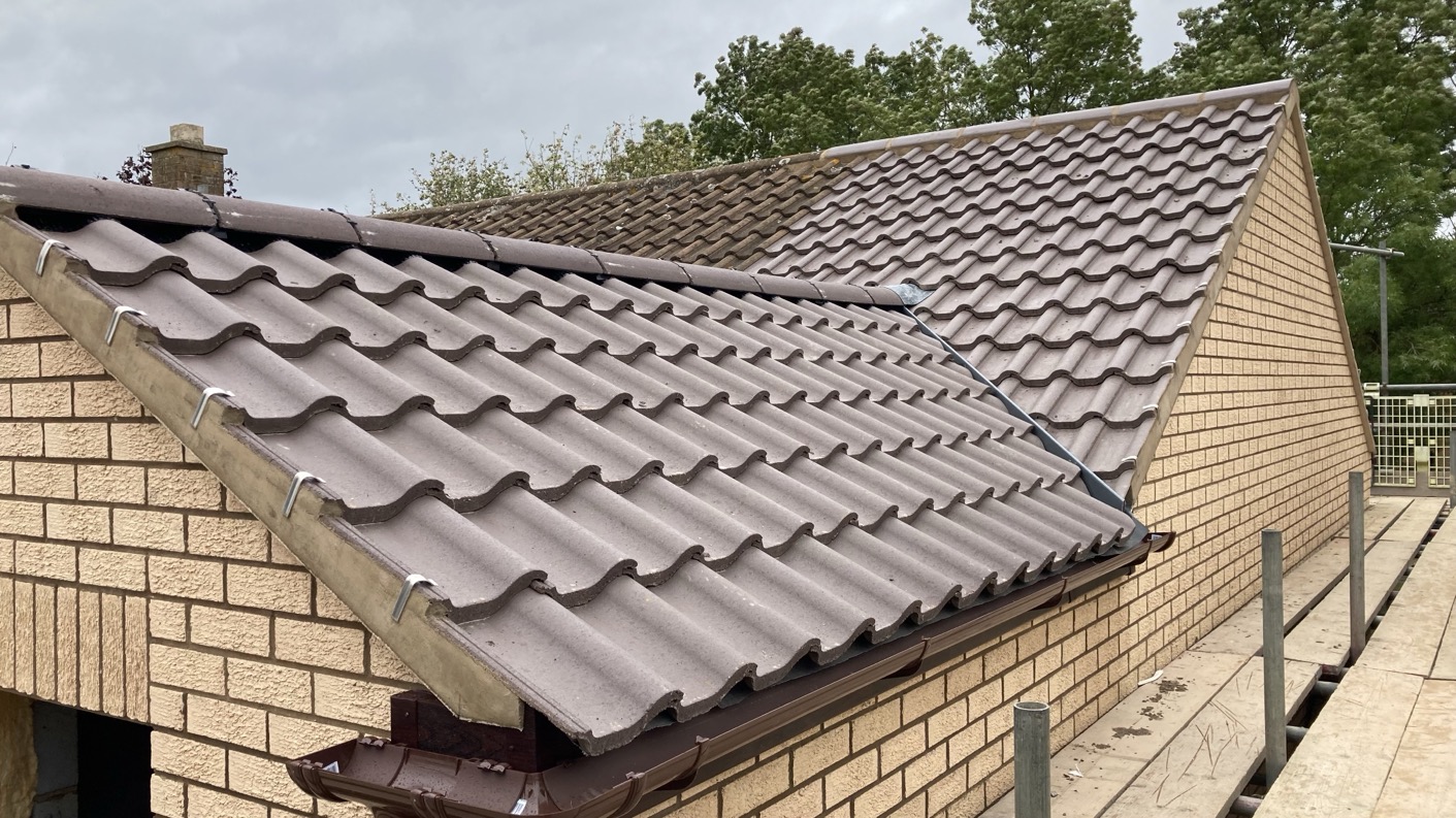 Building extension above the garage and at the rear in Oldbrook